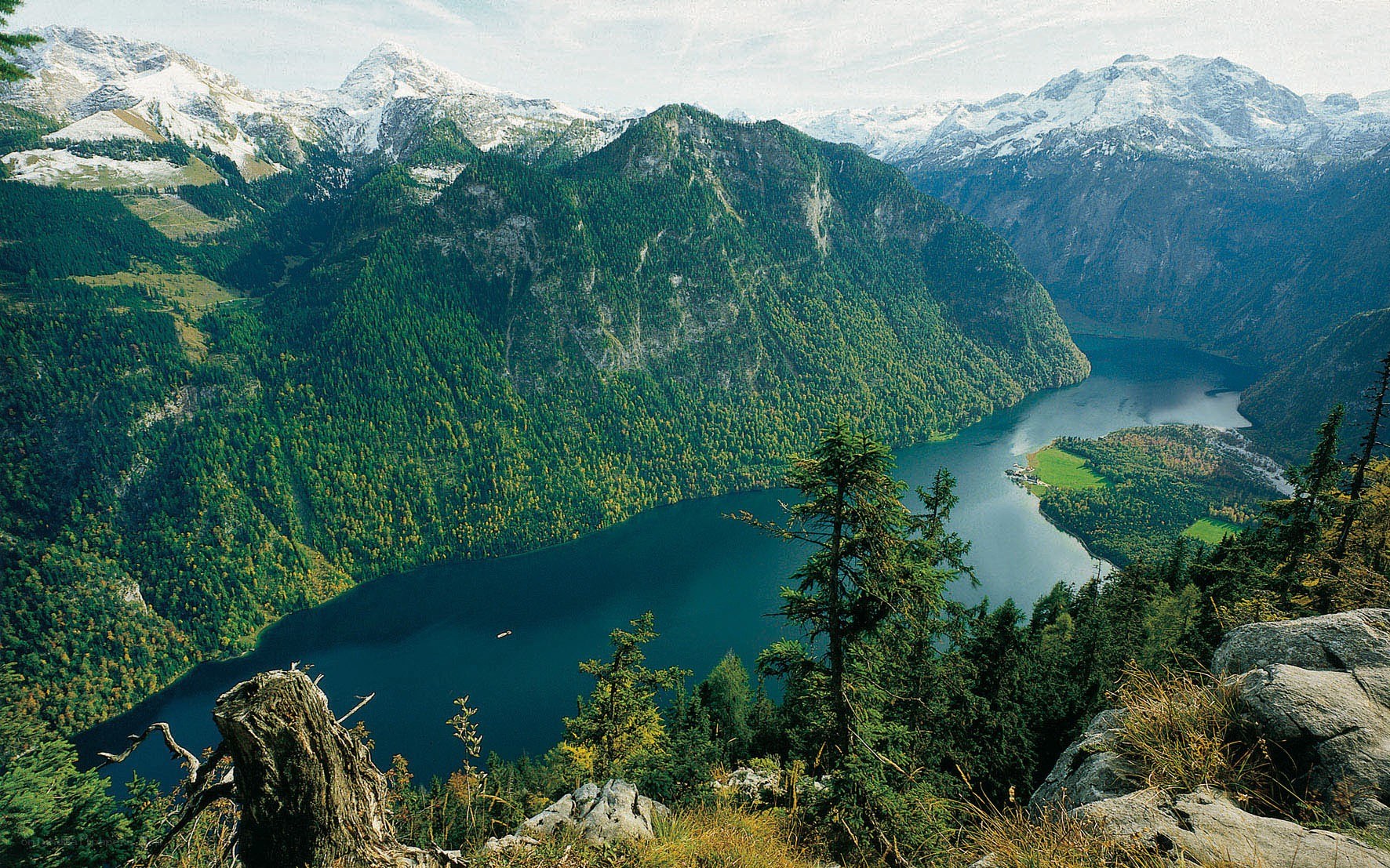 Alpine lake and snow-capped mountains