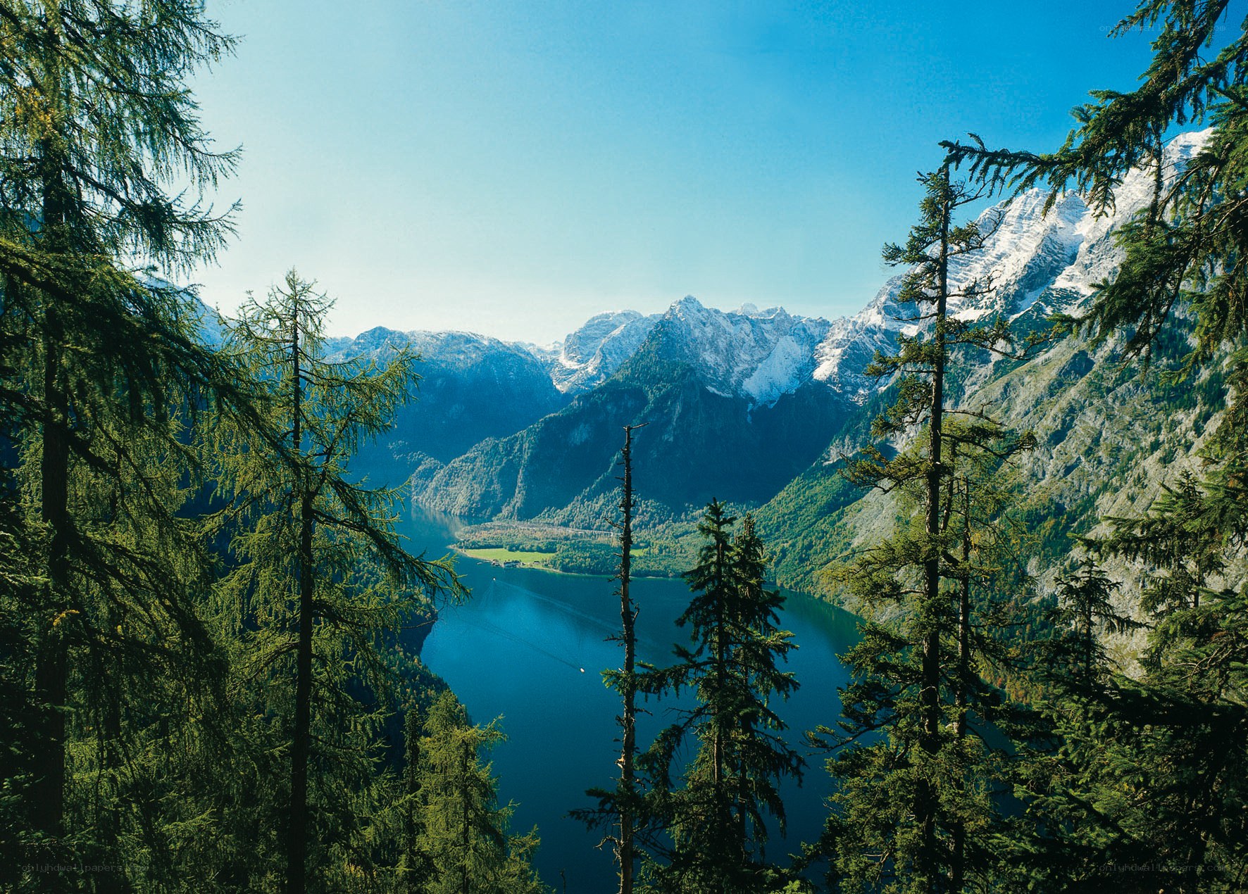 Alpine lake and snow-capped mountains