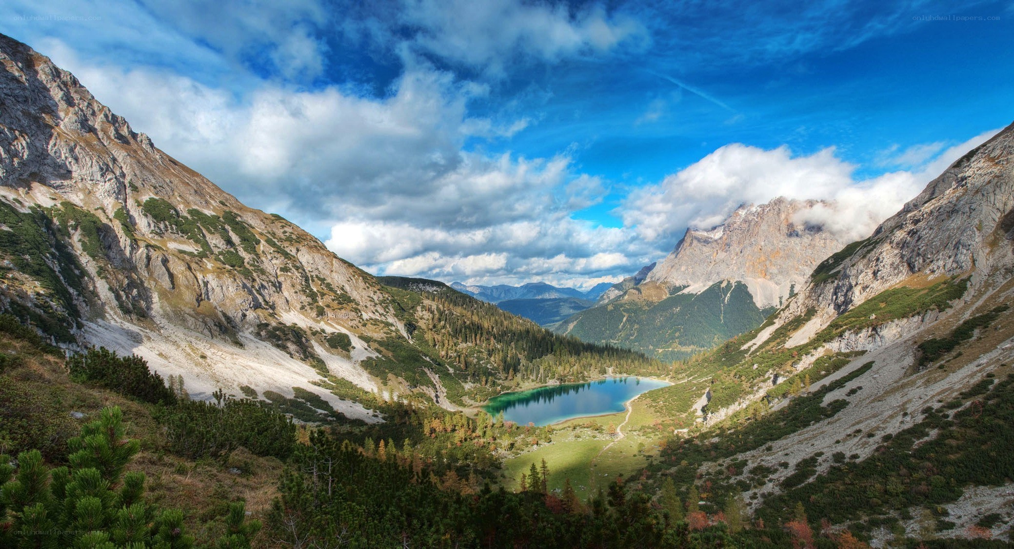 alpine lake in mountain valley