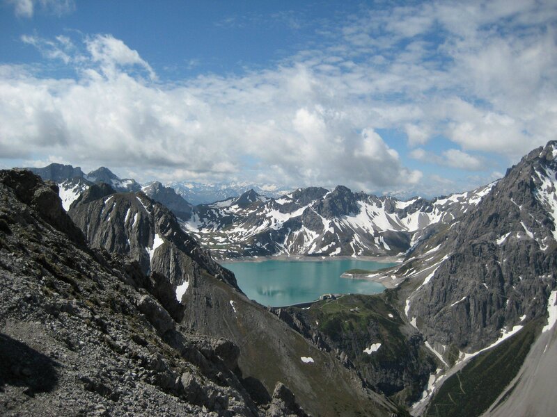 alpine lake surrounded by mountains