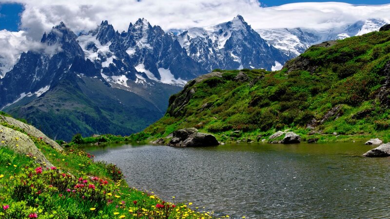 Alpine Lake with Mountains — Green, Serene, Summer, Photograph, Flowers, Clouds