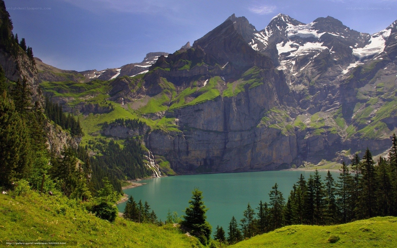 alpine lake with snow-capped mountains