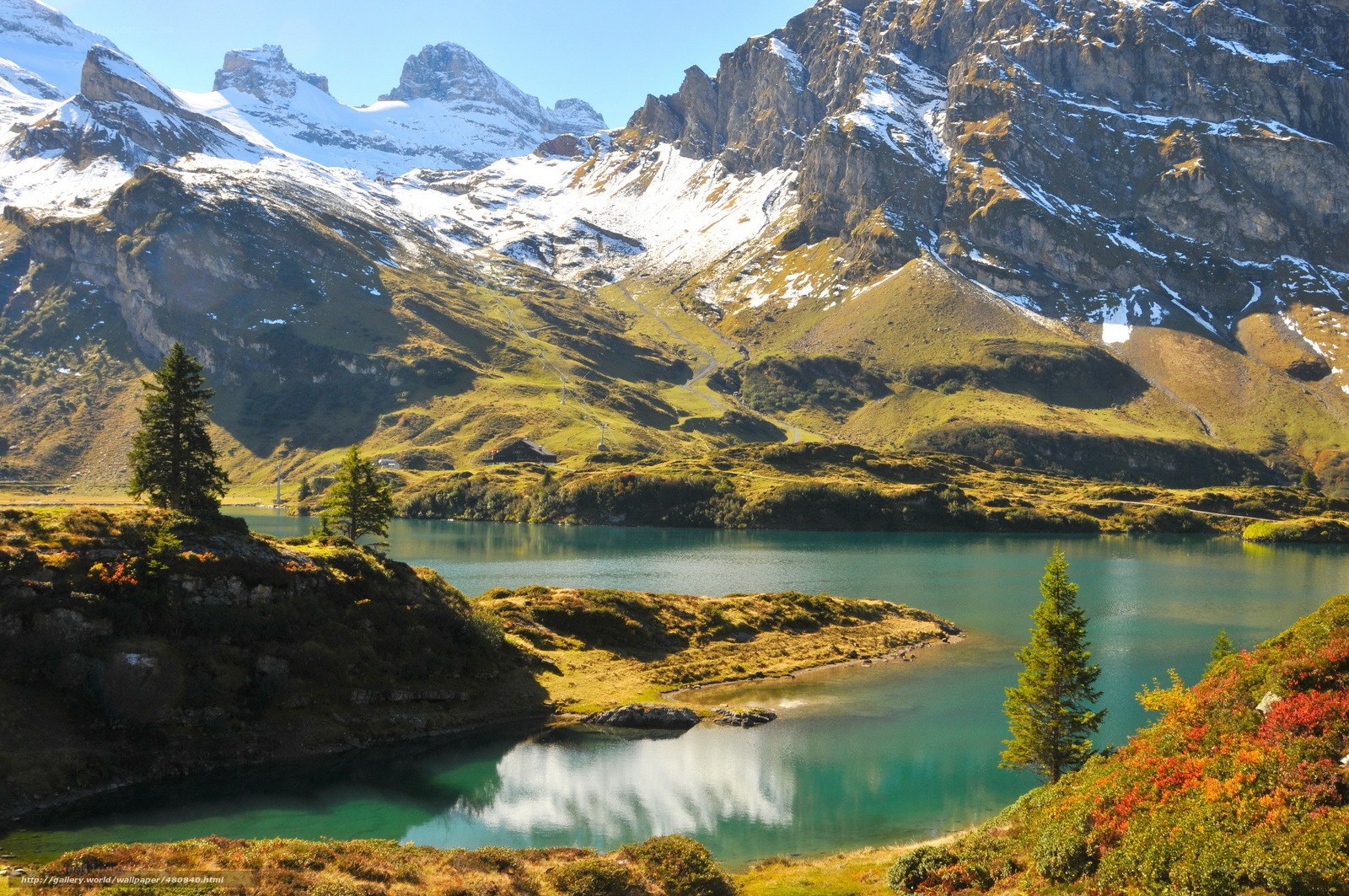 alpine lake with snow-capped mountains