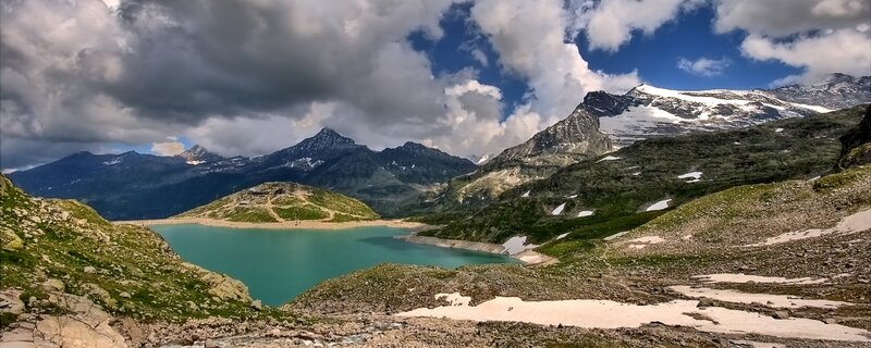 alpine lake with snow-capped mountains