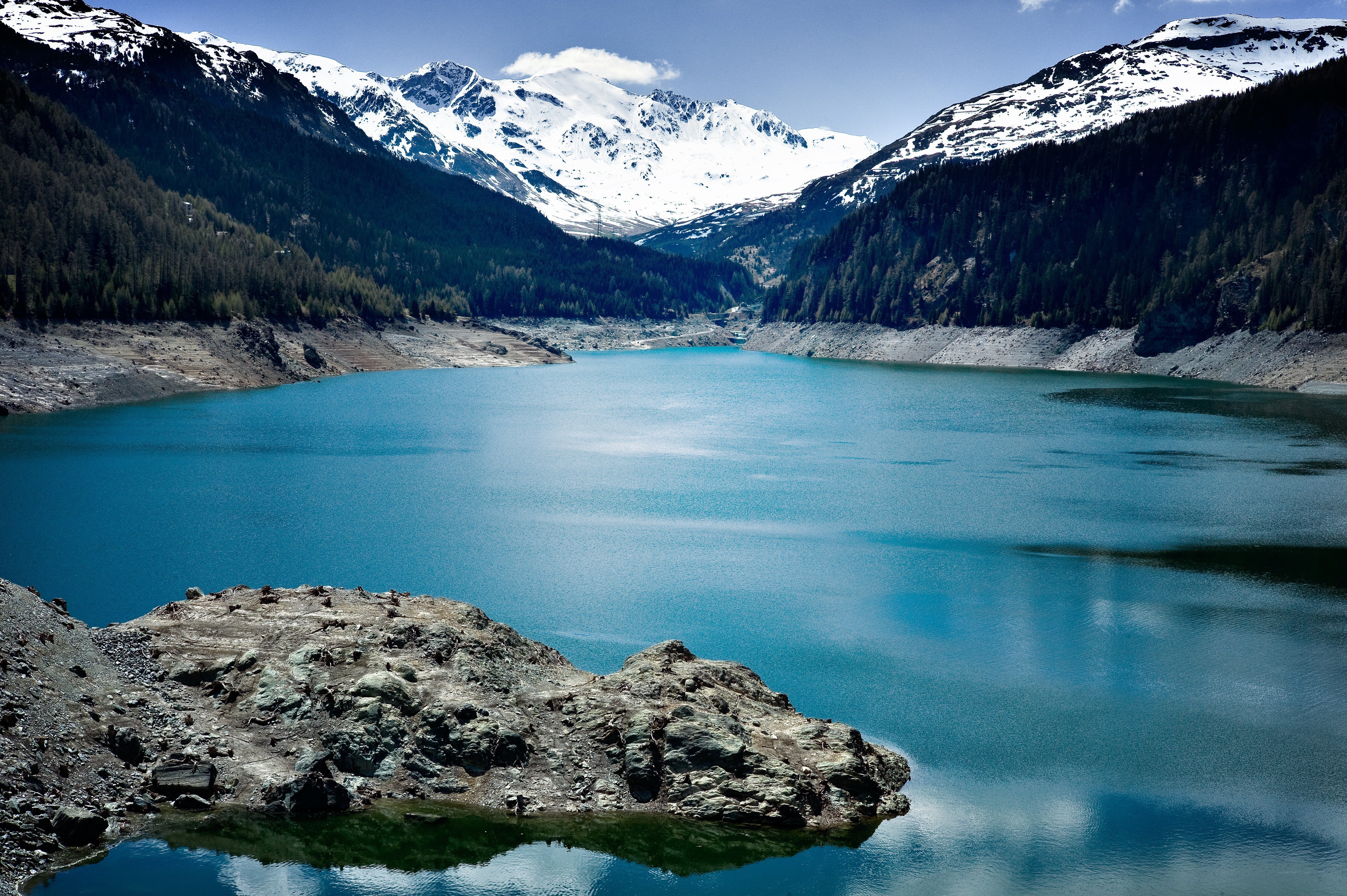 alpine lake with snow-capped mountains
