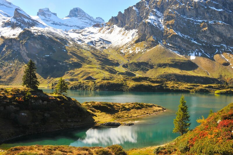 alpine lake with snow-capped mountains