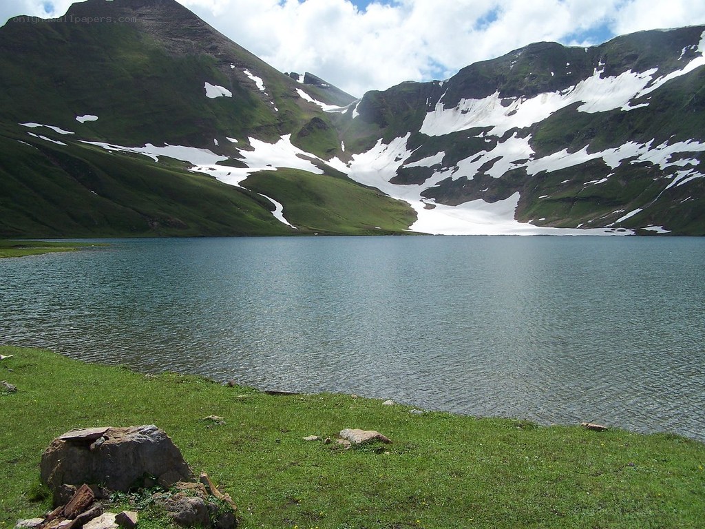 alpine lake with snow-capped mountains