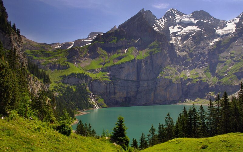 alpine lake with snow-capped mountains