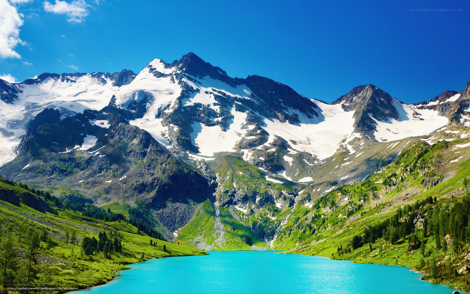 alpine lake with snow-capped mountains