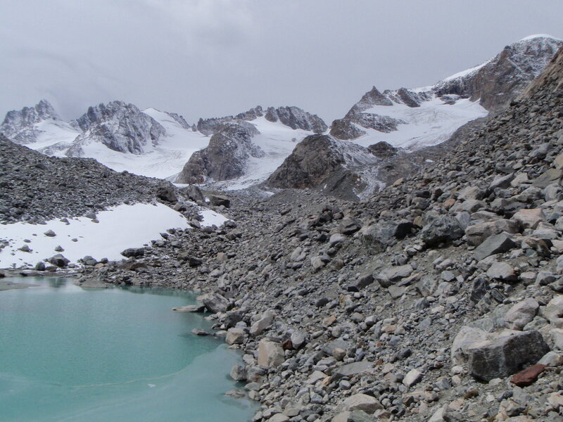 alpine lake with snow-capped peaks