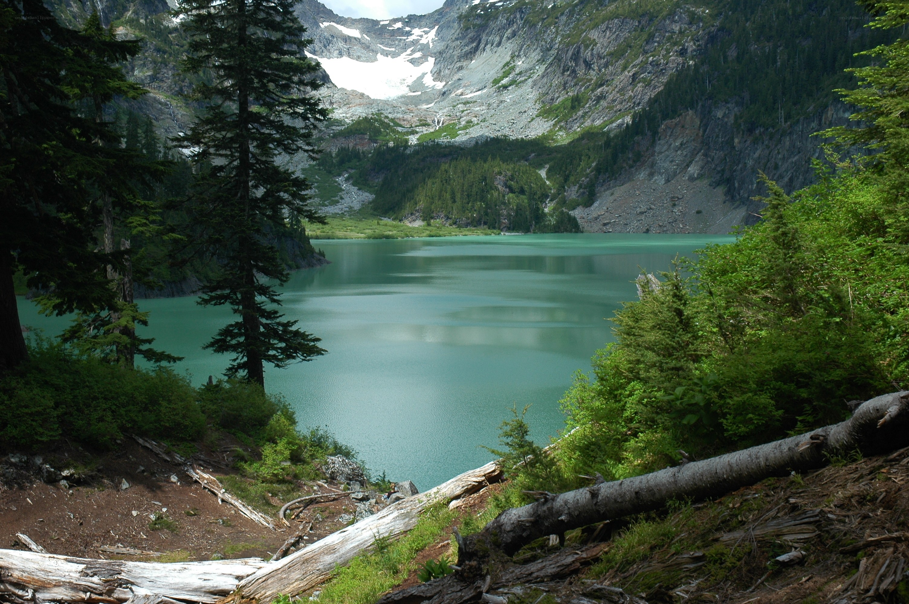 alpine lake with snow-capped peaks