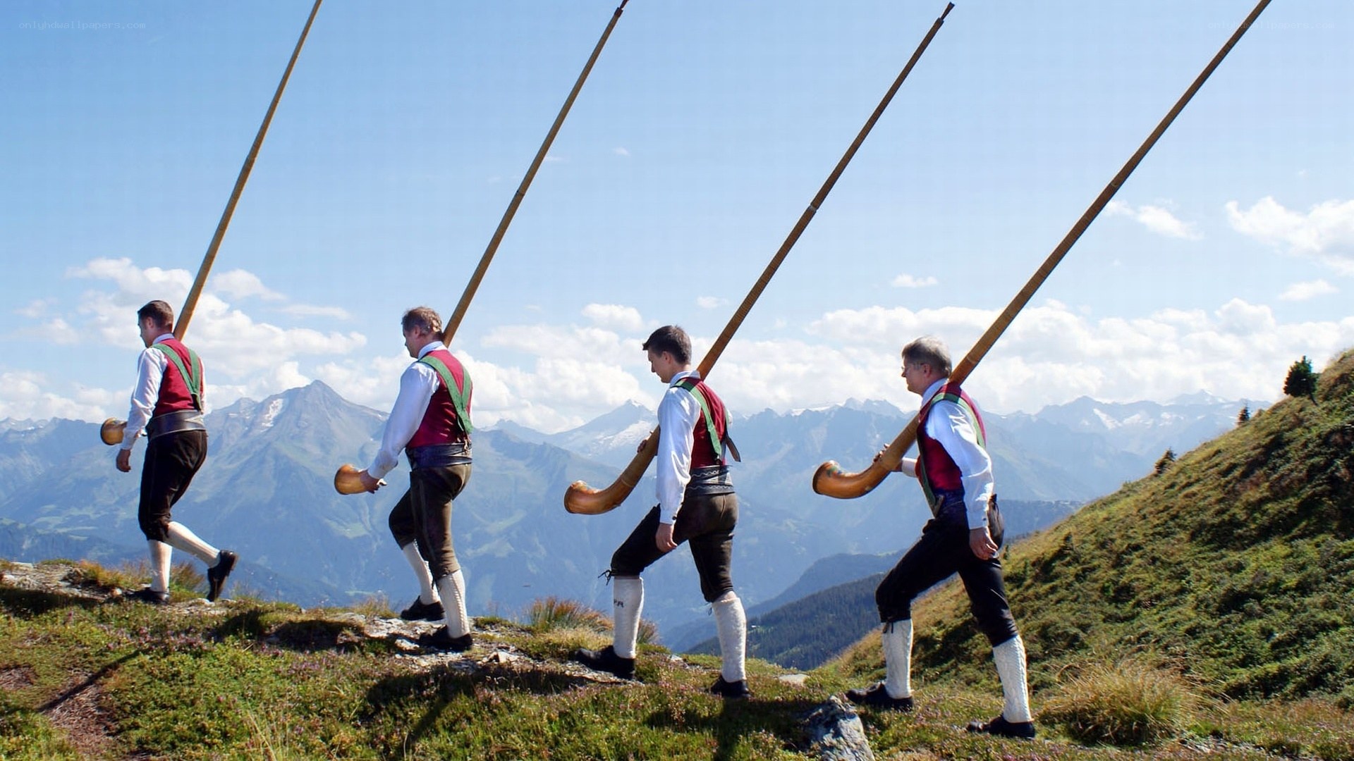 Alpine musicians on a mountain trail