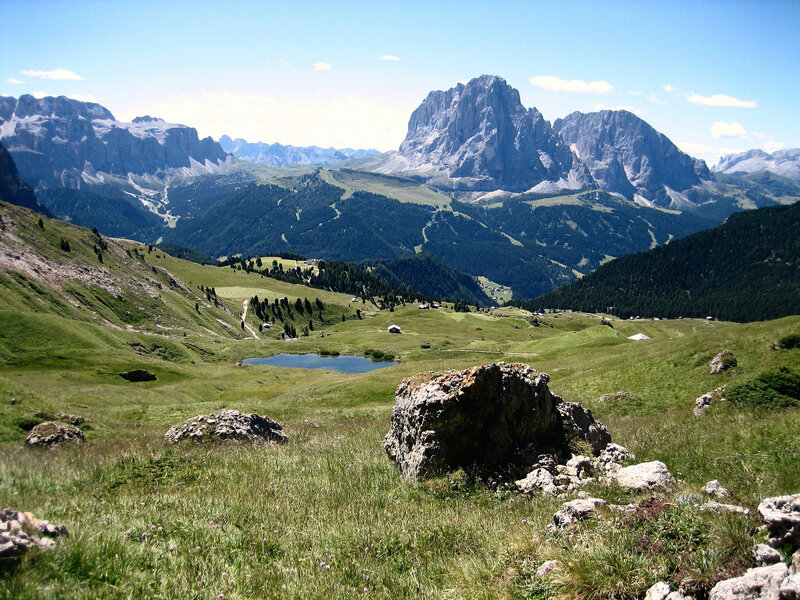 Alpine valley with mountain peaks
