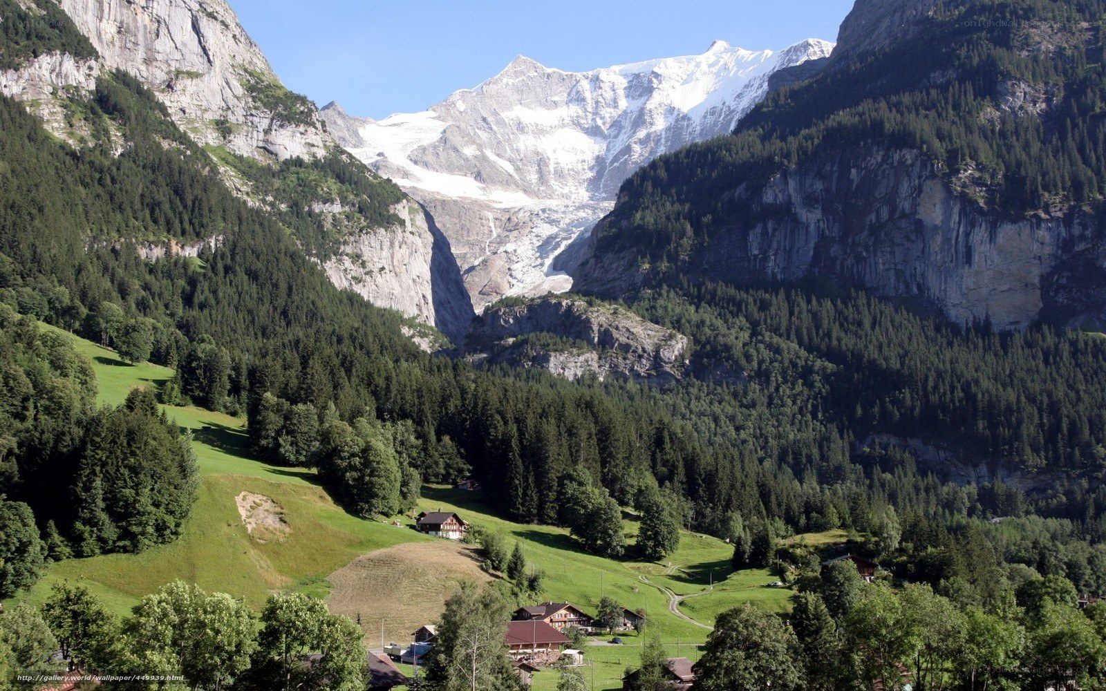 Alpine valley with snow-capped mountains