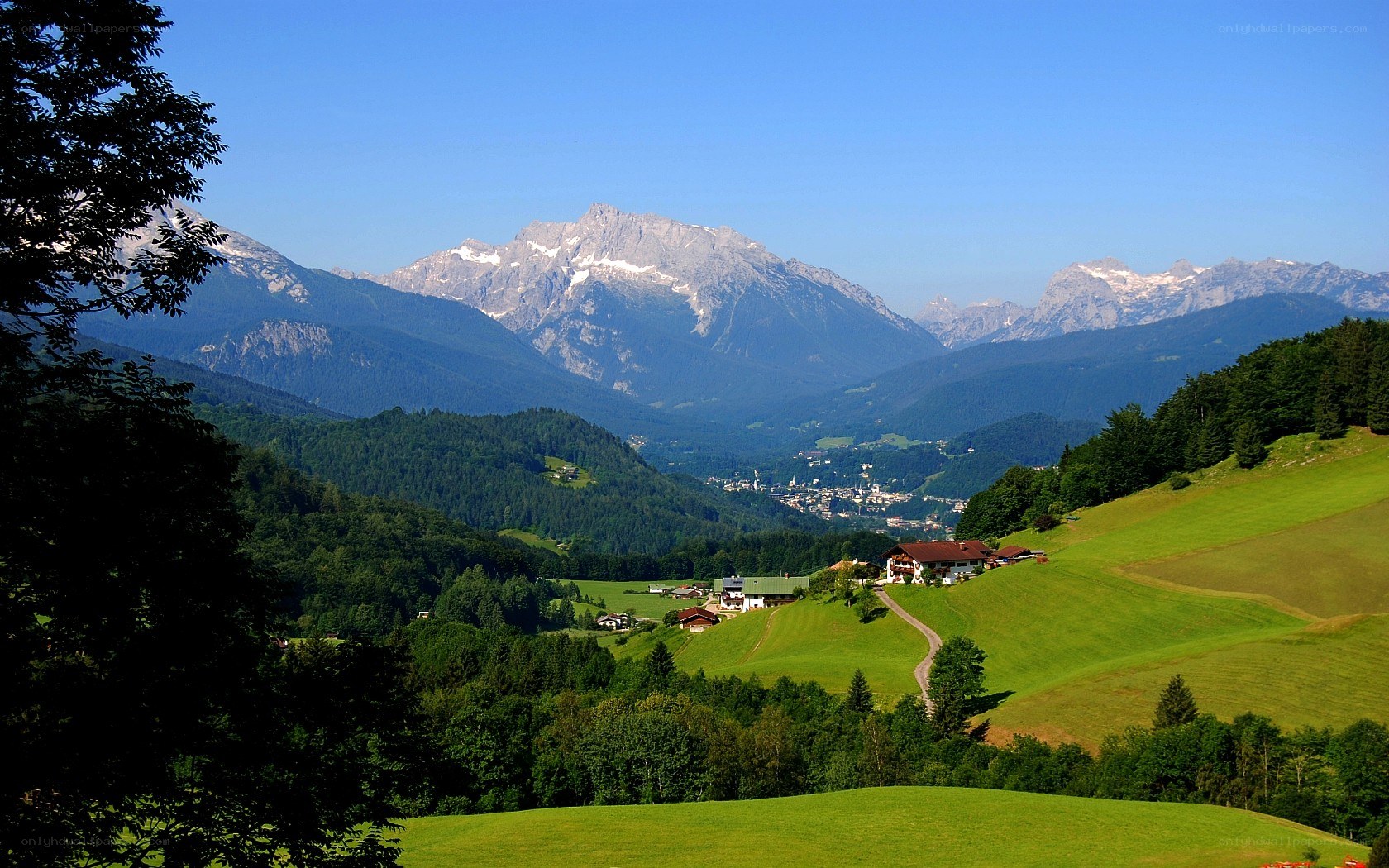 Alpine valley with snow-capped mountains