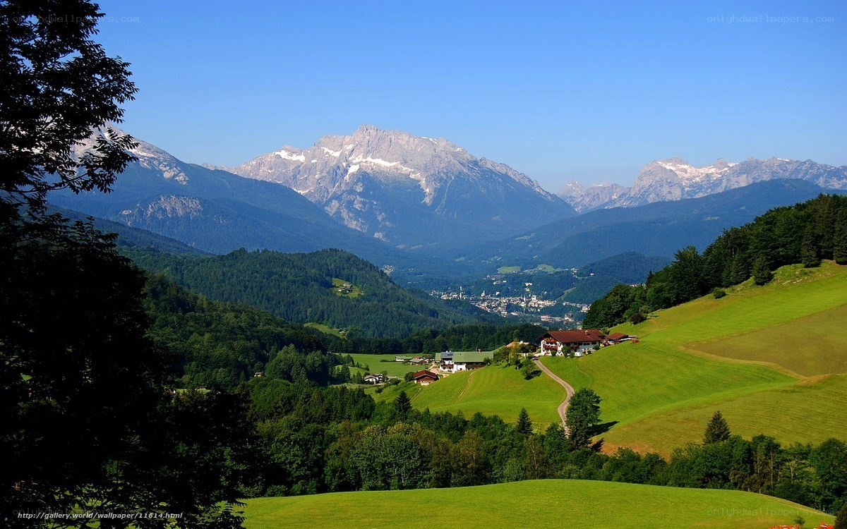 Alpine valley with snow-capped mountains