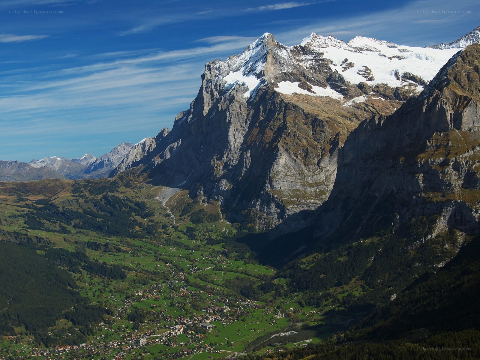 Alpine valley with snow-capped peaks