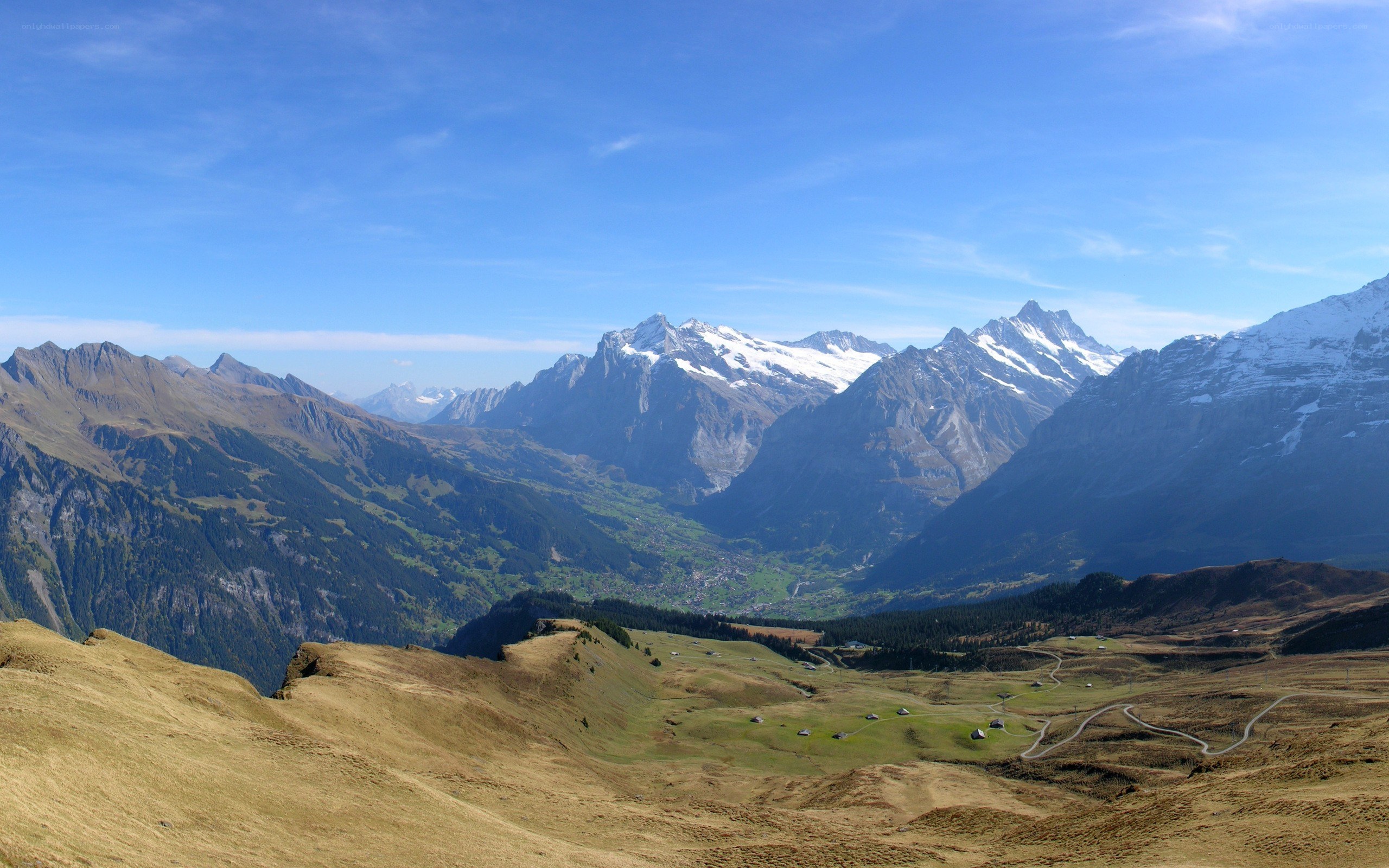 Alpine valley with snow-capped peaks