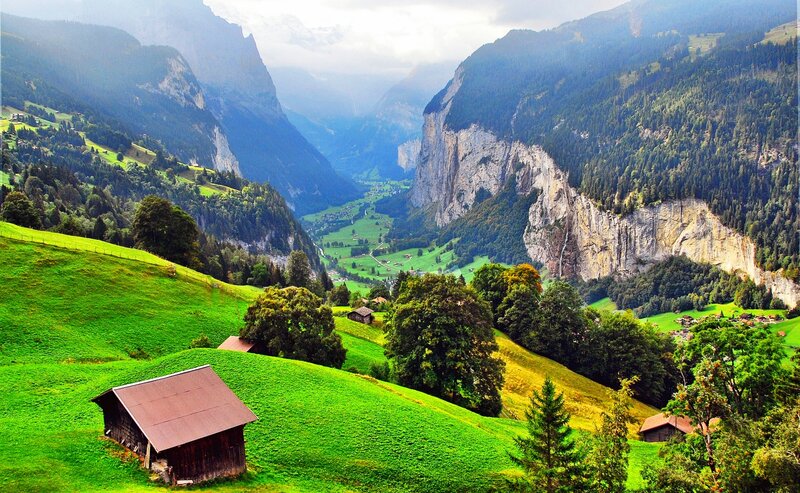 Alpine Valley with Wooden Hut