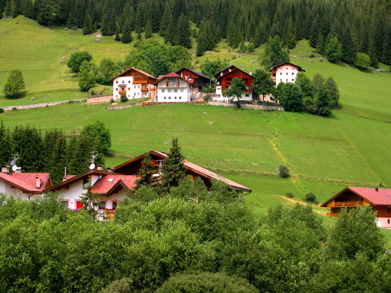 Alpine Village on Hillside — Green, Serene