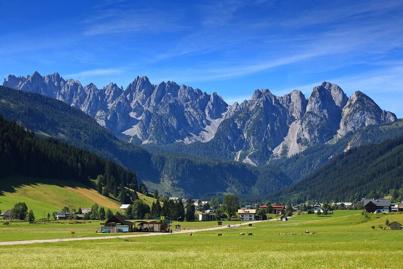 Alpine village with mountain backdrop