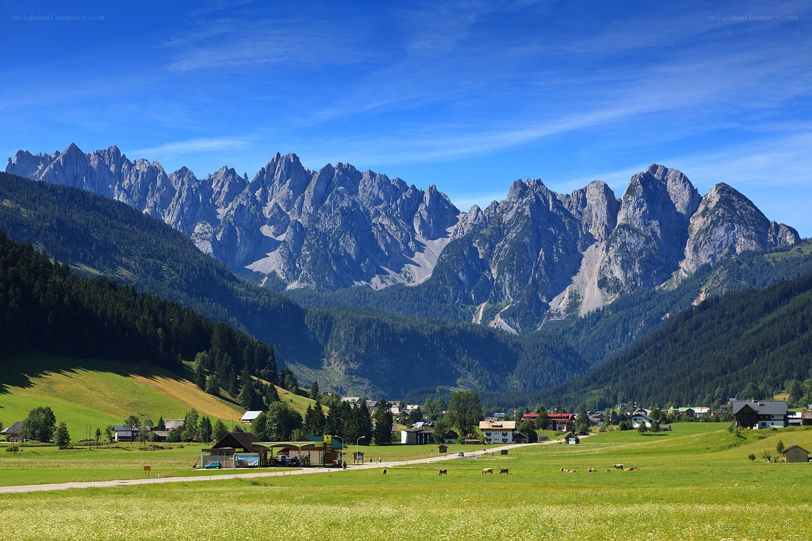 Alpine village with mountain backdrop