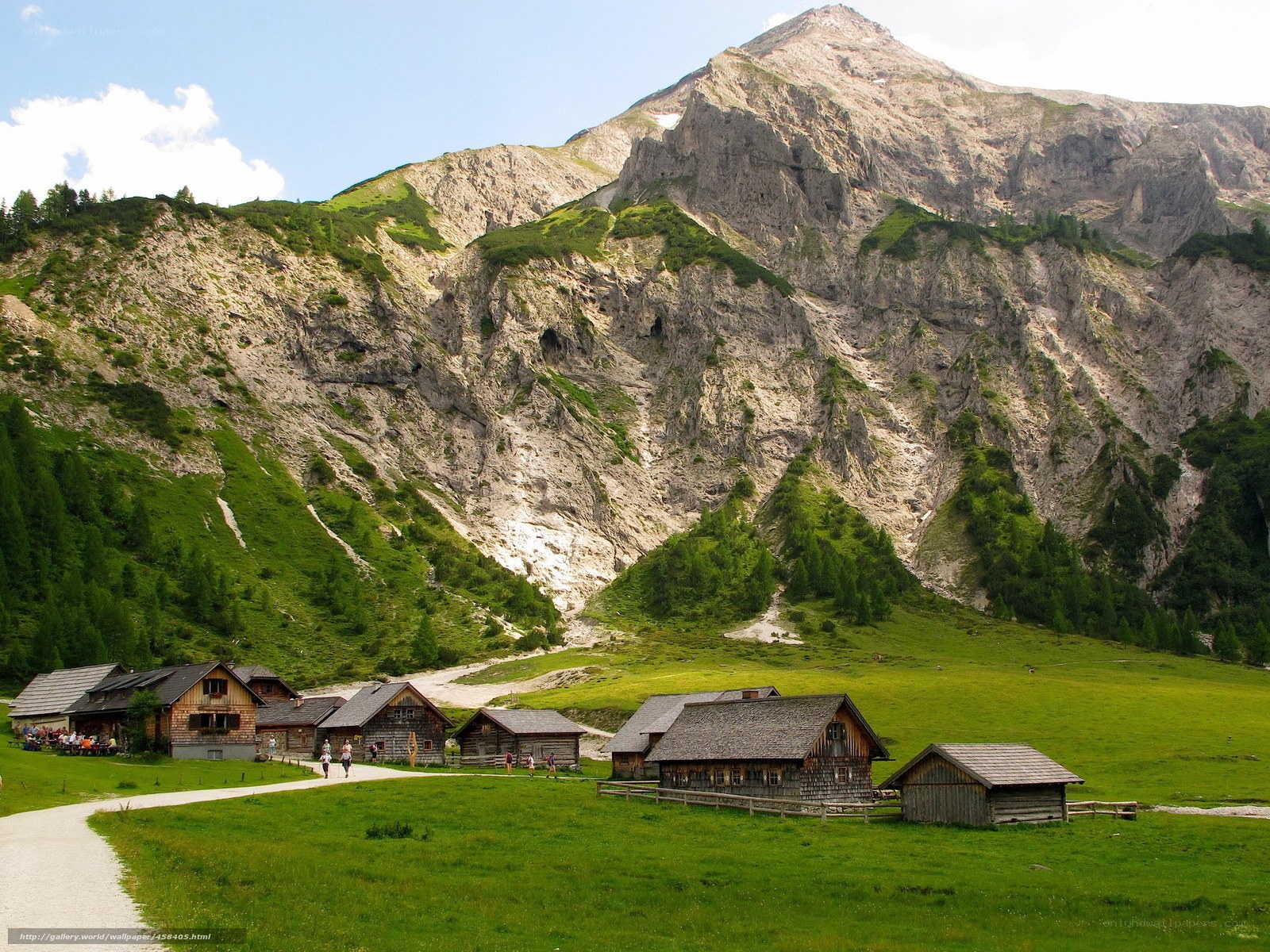 Alpine village with mountain backdrop