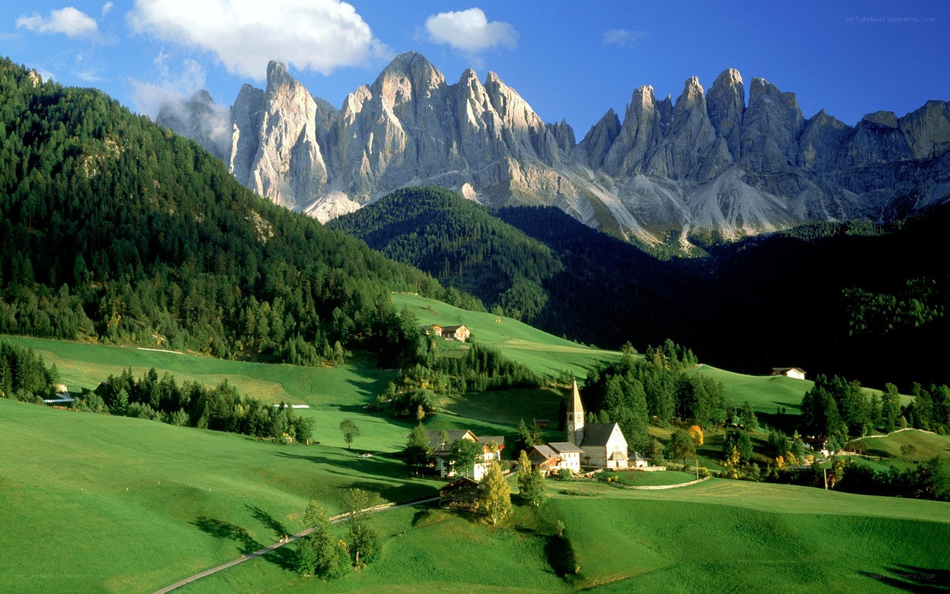 Alpine village with mountain backdrop