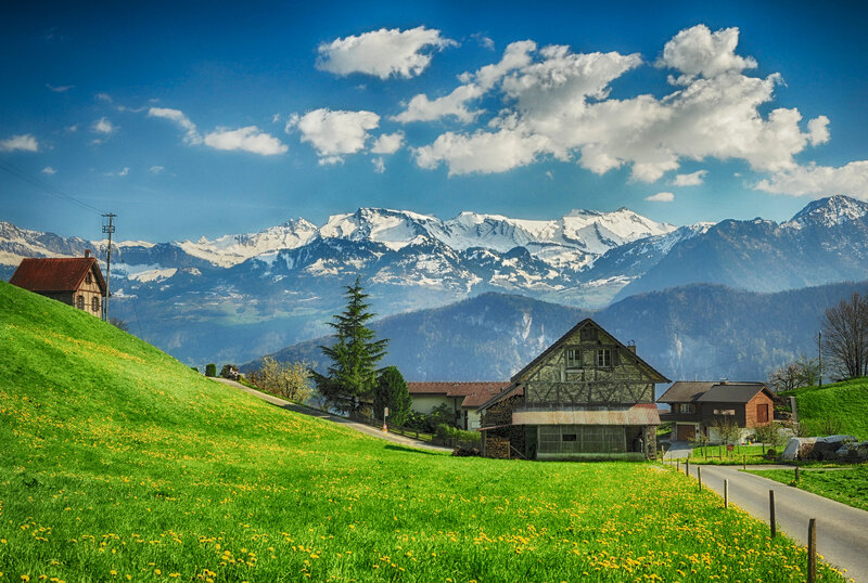 Alpine Village with Mountains — Blue