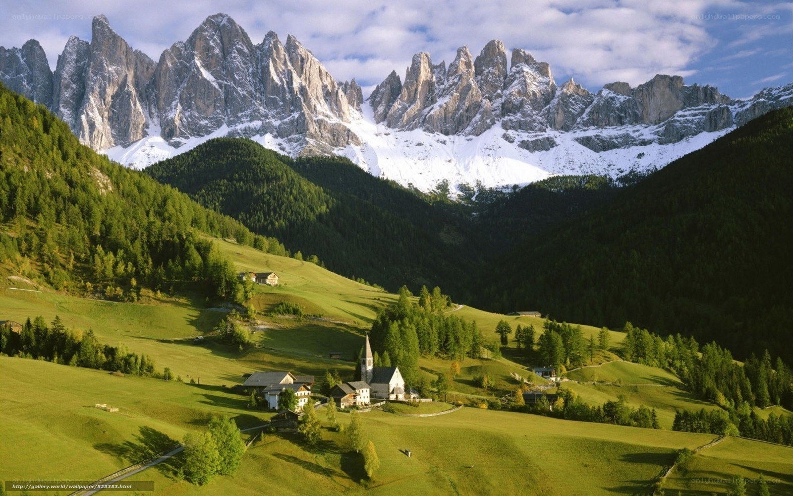 Alpine village with snow-capped peaks