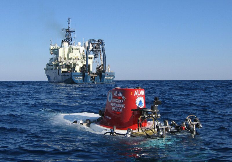 Alvin submersible near research vessel