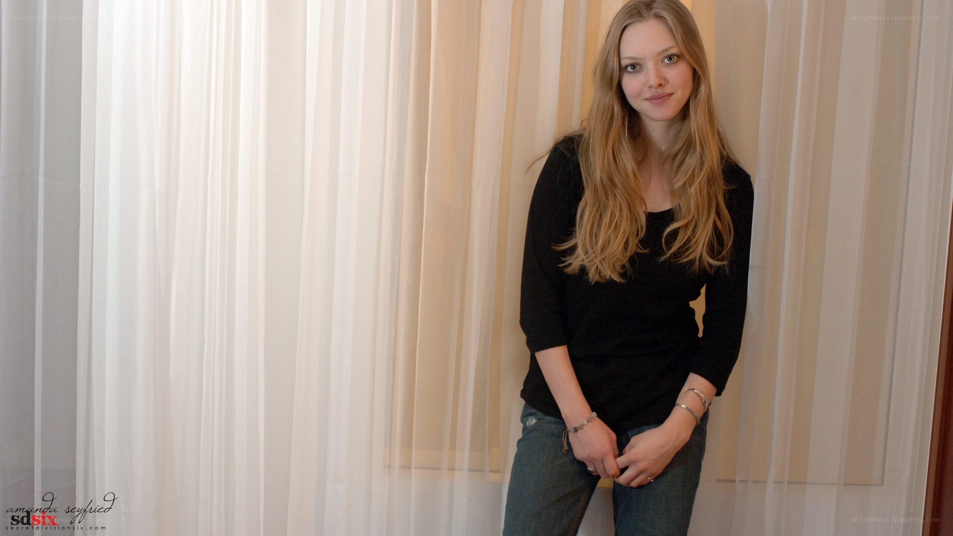 Amanda Seyfried in a black top