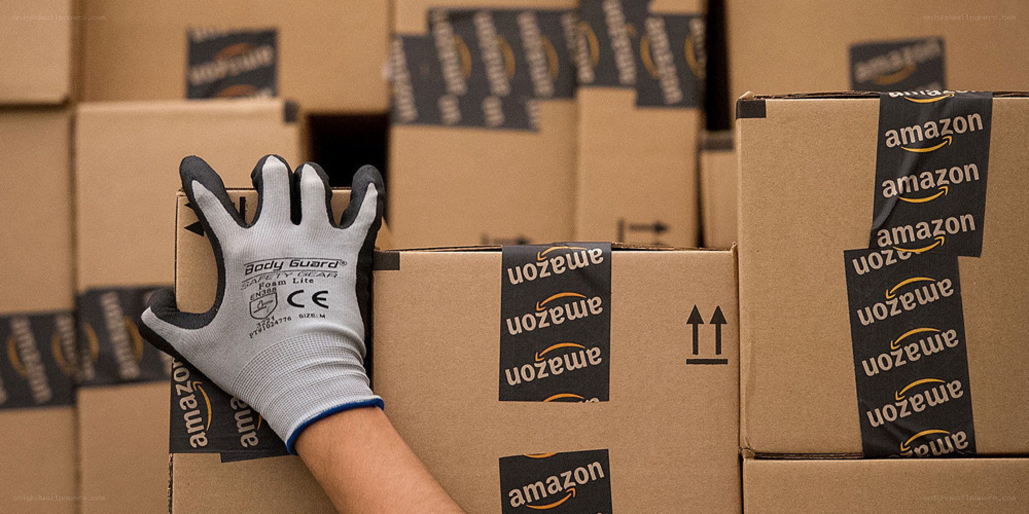 Amazon warehouse worker handling boxes