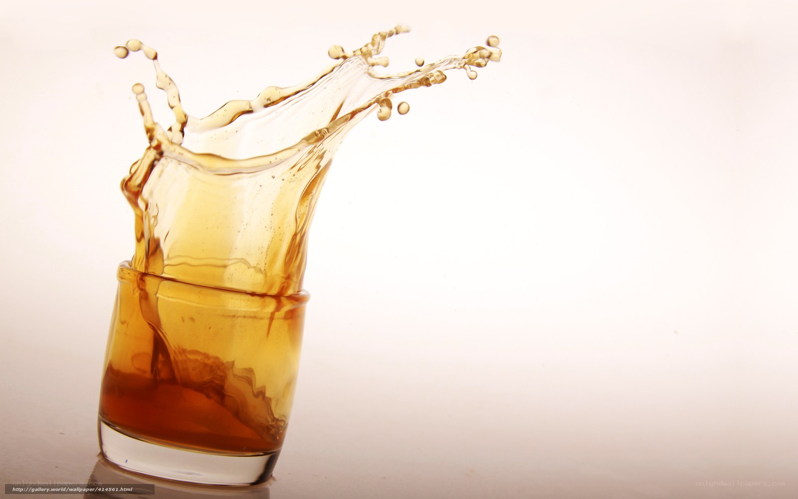 amber liquid splash in glass