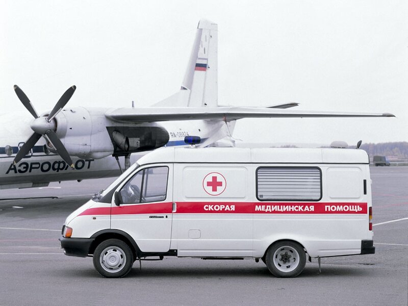Ambulance near an airplane