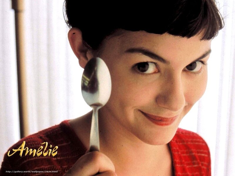 Amelie holding a spoon