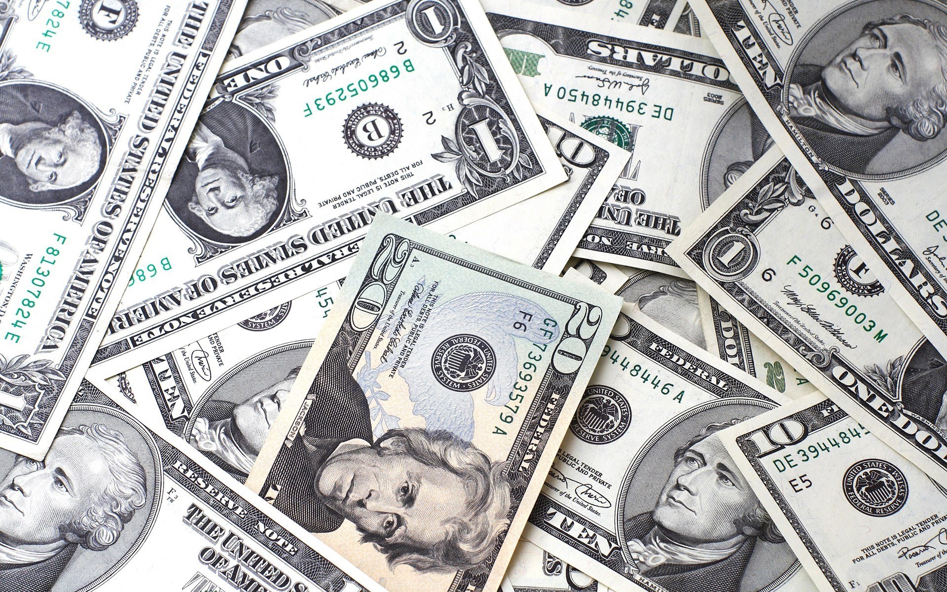 American dollar bills scattered