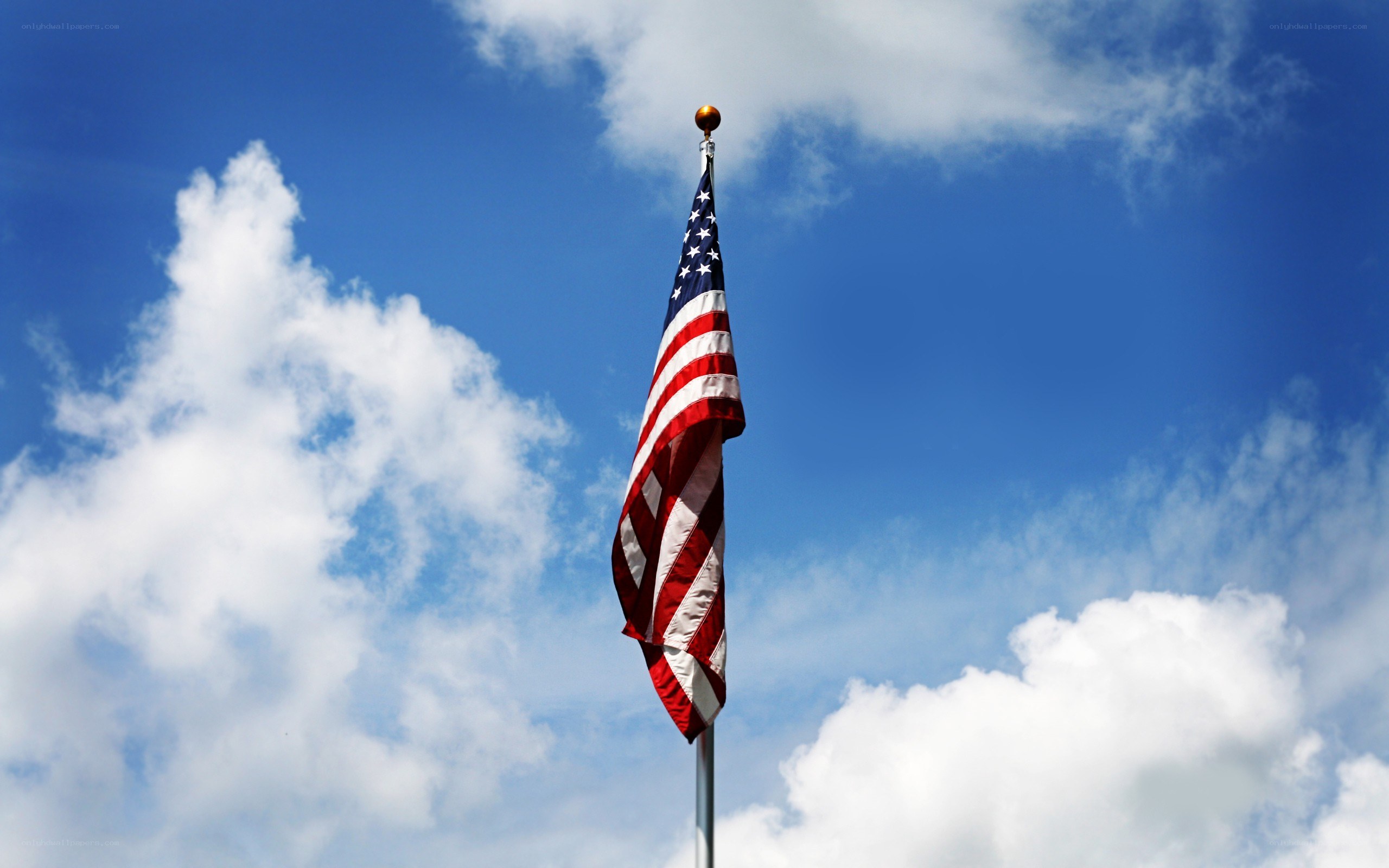 American flag against blue sky