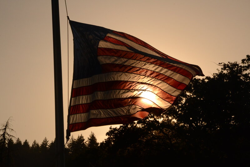 American Flag at Sunset — Red