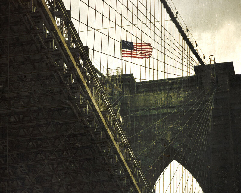 American flag on a bridge