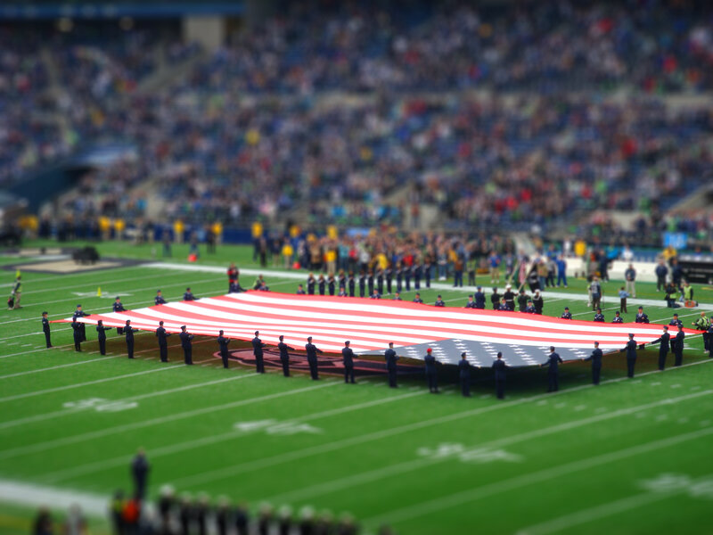 American flag on football field