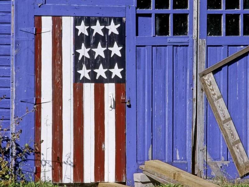 American flag painted on a barn door