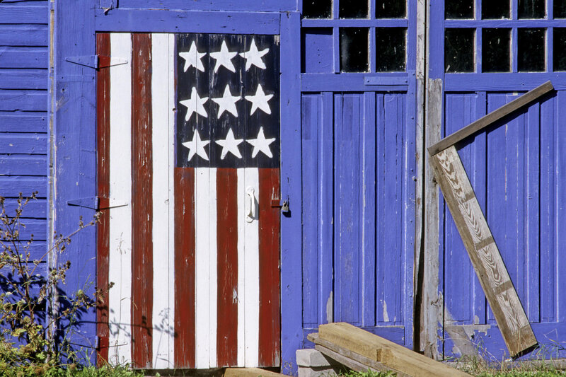 American flag painted on a shed door