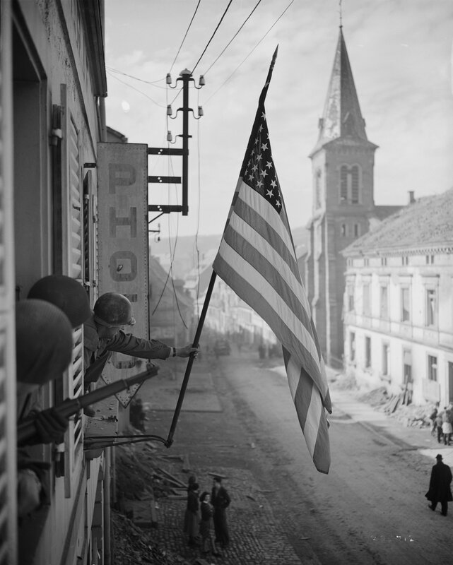 American flag raised in liberated town
