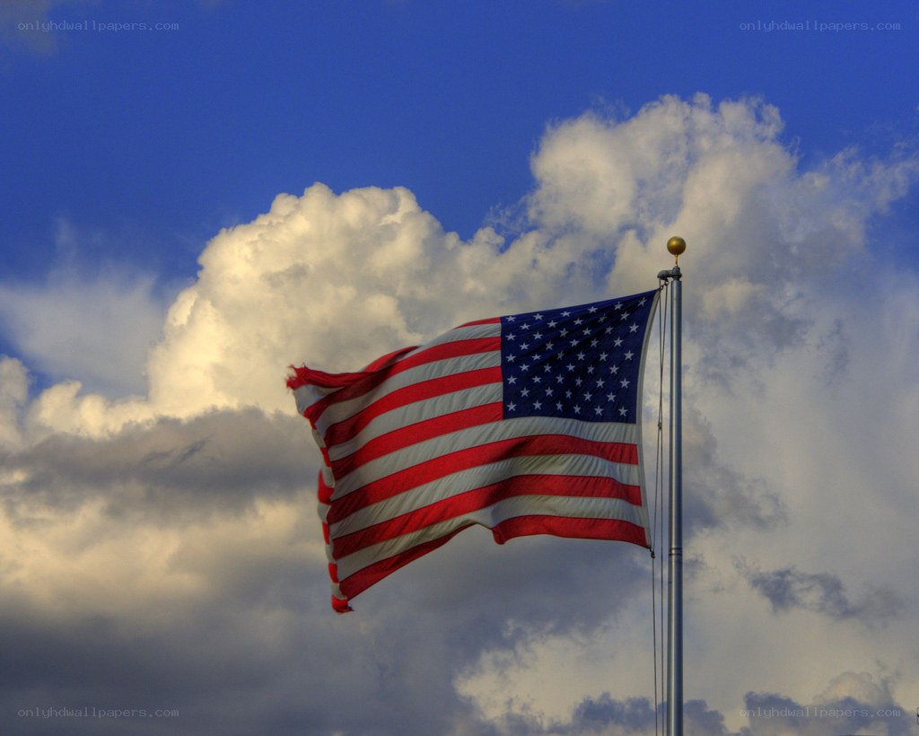 American flag waving in sky