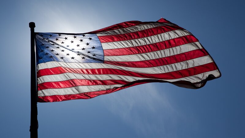 American Flag Waving — Red, Dramatic, Afternoon