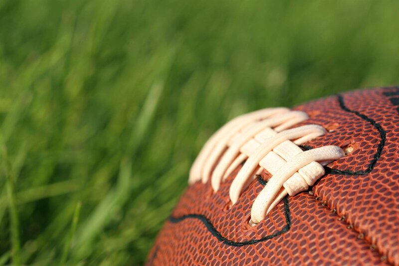 American Football on Grass — Brown, Calm