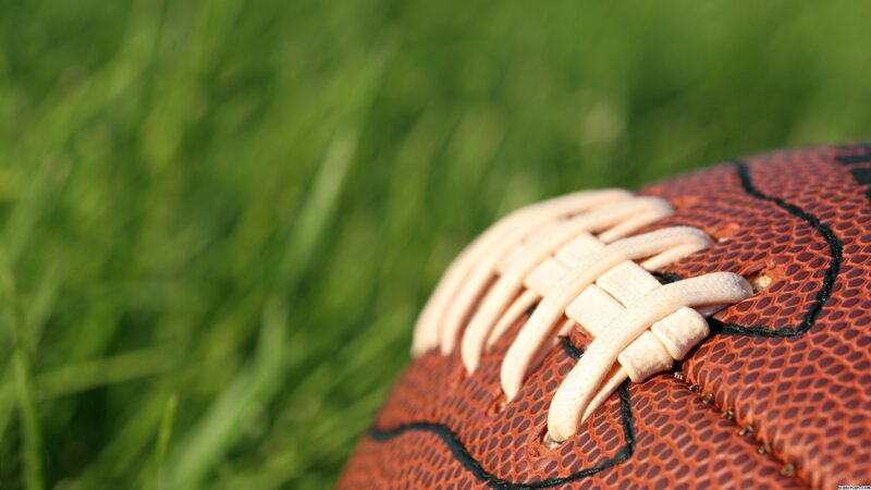 American Football on Grass — Brown