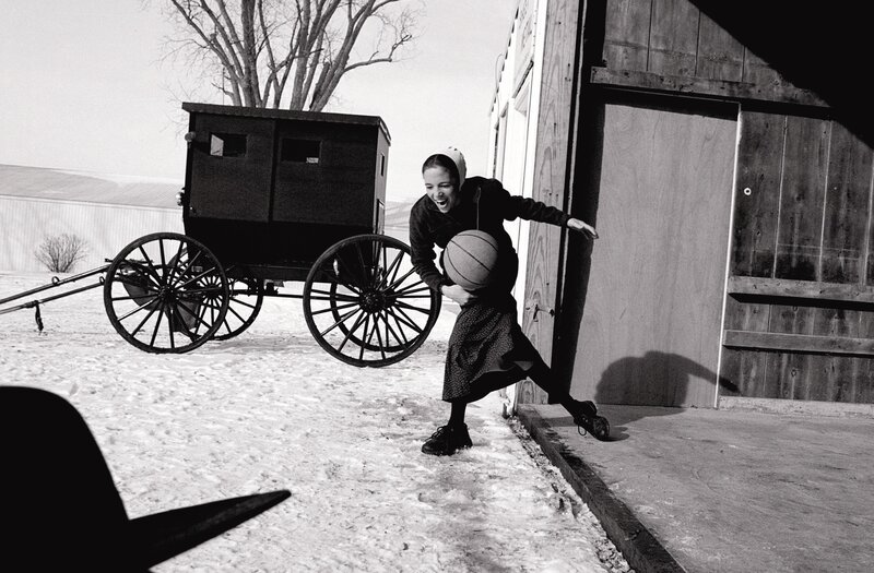 Amish woman playing basketball