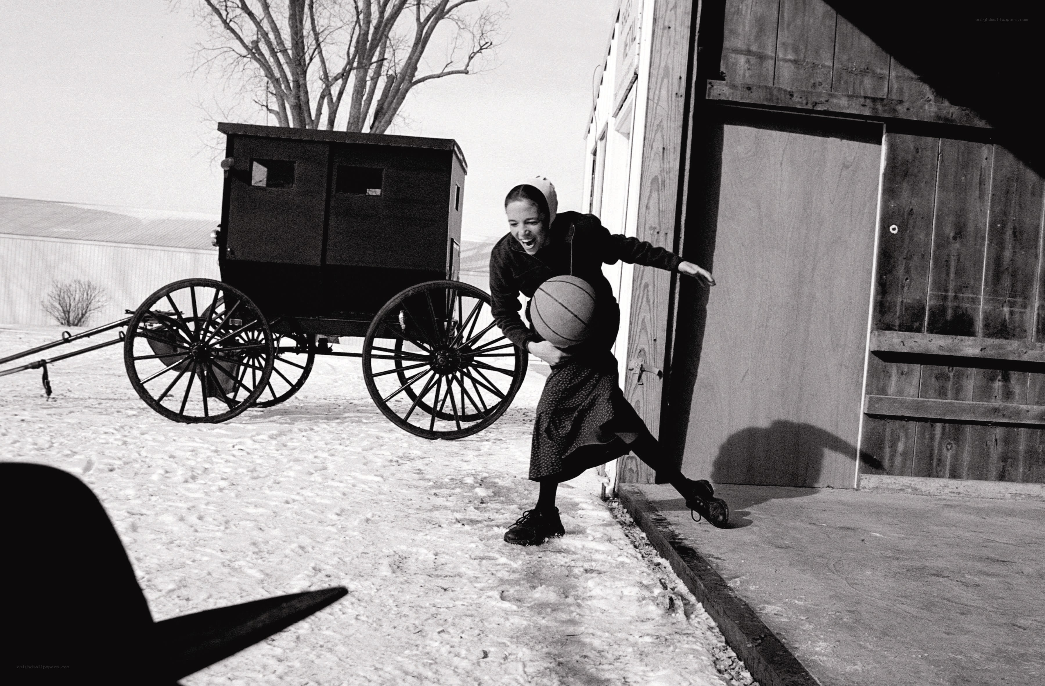 Amish woman playing basketball